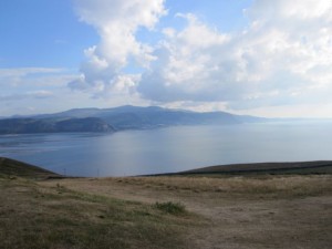 The Orme is the highest point in the area.  I'm a little fuzzy on the details, but Snowdonia (across the water) does not count because it is a mountain range.