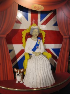 Her Majesty the Queen, and one of her many corgis. 