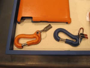 They had many cute handbags, but I opted for a picture of these carabiners as I felt they best symbolized the tendency to make a practical item into a luxury accessory.  